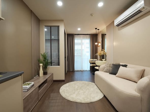 bedroom and living room and kitchen of The Clover