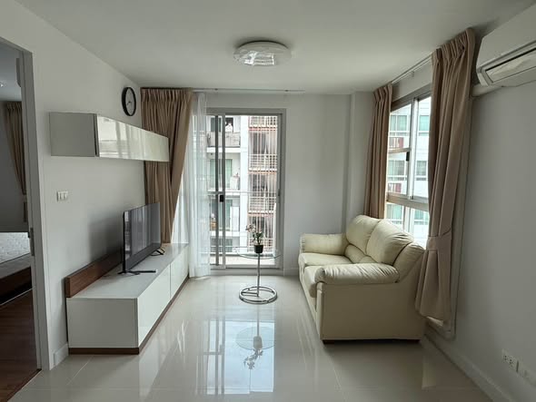 living room and bedroom of The Clover