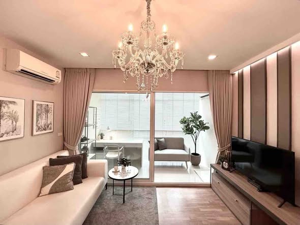 bedroom and living room of The Coast Bangkok