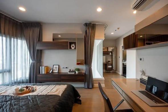 living room and bedroom of The Crest Sukhumvit 34