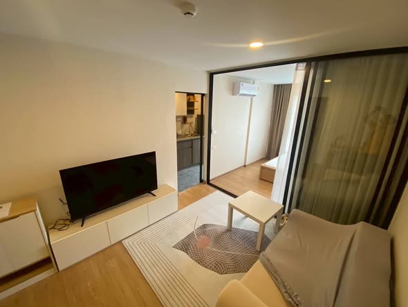bedroom and living room of The Cube Loft Srinakarin