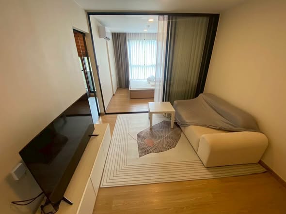 living room and bedroom of The Cube Loft Srinakarin