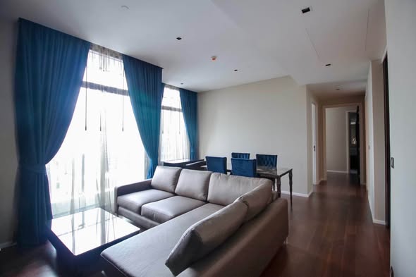 bedroom and living room of The Diplomat 39