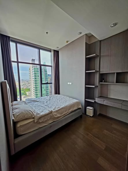 bedroom of The Diplomat Sathorn