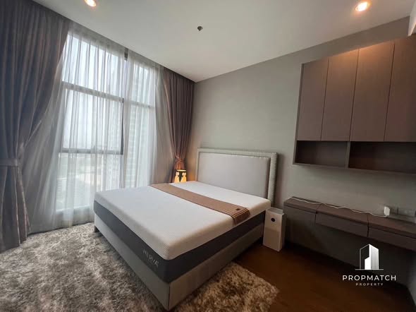 bedroom of The Diplomat Sathorn