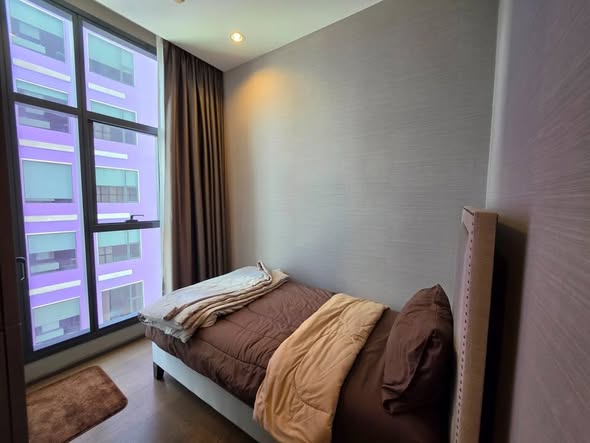 bedroom of The Diplomat Sathorn