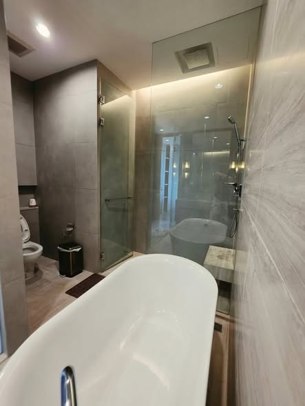 room interior and bathroom of The Diplomat Sathorn