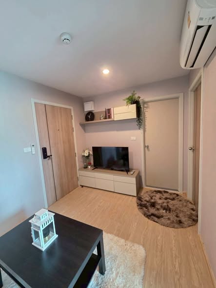 living room and bedroom of The Excel Ratchada 18