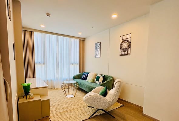 living room and bedroom of The Forestias by MQDC