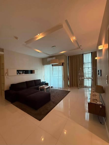 bedroom and living room of The Fourwings Residence