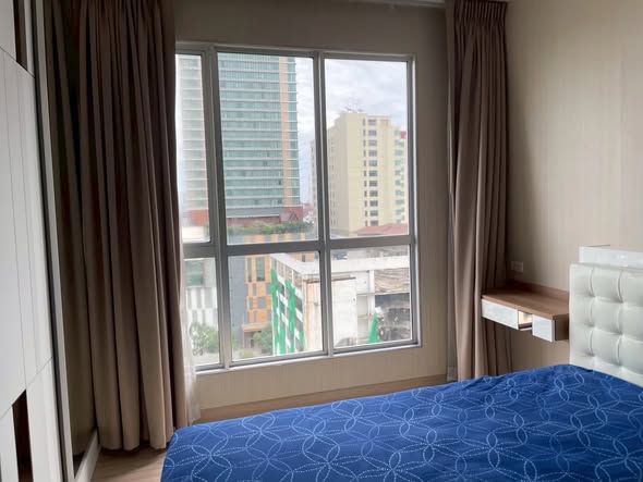 bedroom of The Hotel Serviced Condo เดอะโฮเทล คอนโด
