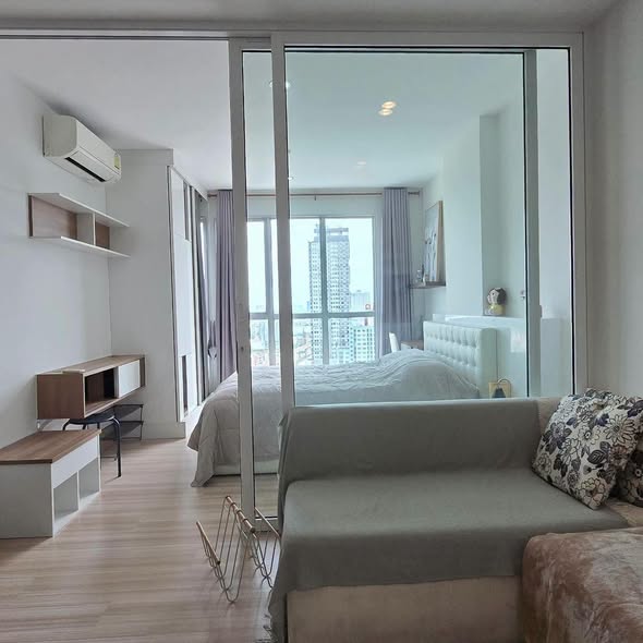 bedroom and room interior of The Hotel Serviced Condo เดอะโฮเทล คอนโด