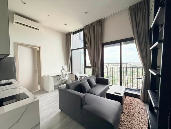 living room and bedroom of THE LINE Sukhumvit 101