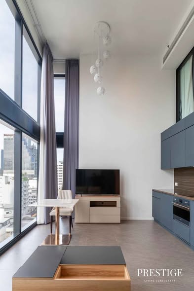 bedroom and living room and room interior of The Lofts Silom by Raimon Land