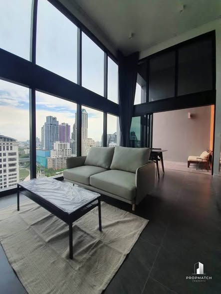 living room of The Lofts Silom by Raimon Land