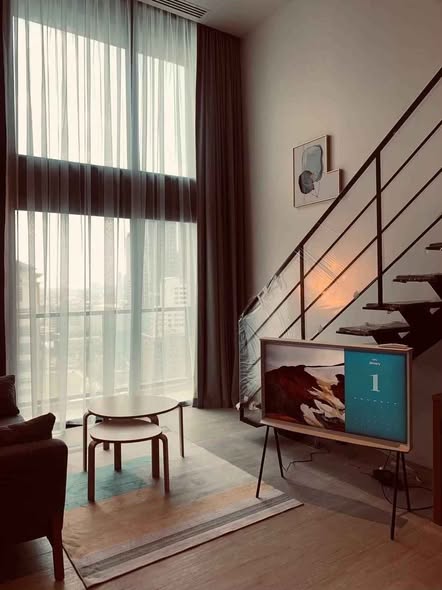 living room of The Lofts Silom by Raimon Land