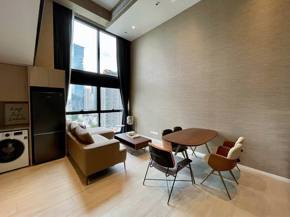 living room of The Lofts Silom by Raimon Land