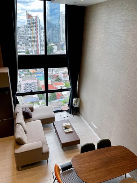 living room of The Lofts Silom by Raimon Land