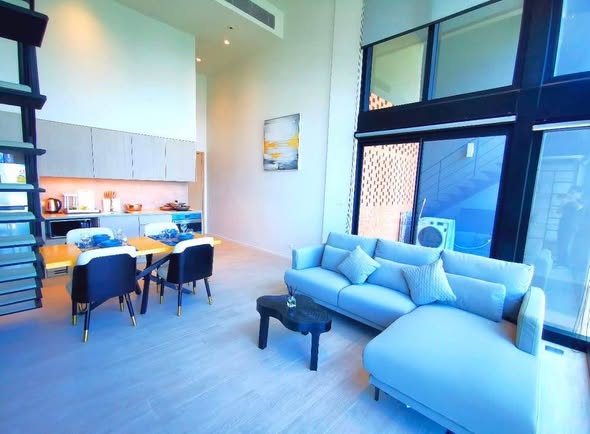 living room of The Lofts Silom by Raimon Land