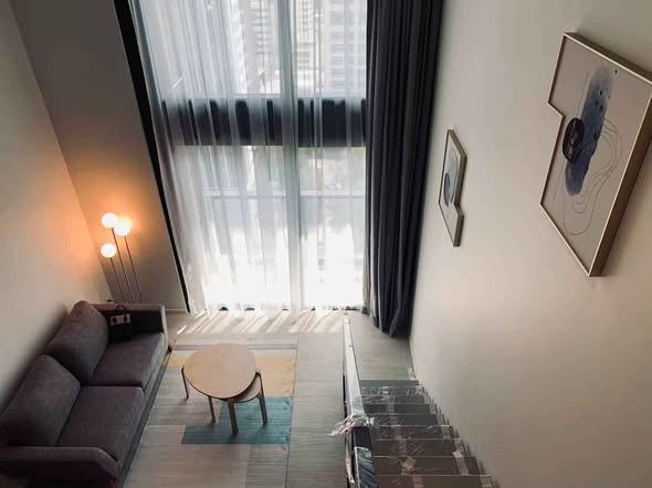living room of The Lofts Silom by Raimon Land