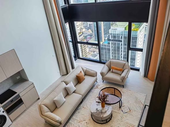 living room of The Lofts Silom by Raimon Land