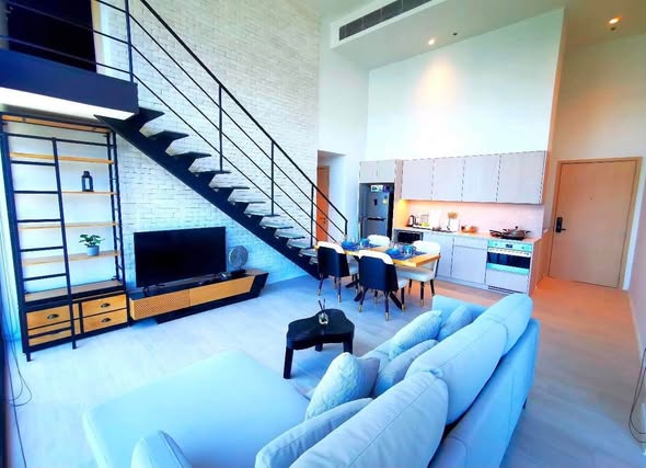 living room and room interior of The Lofts Silom by Raimon Land