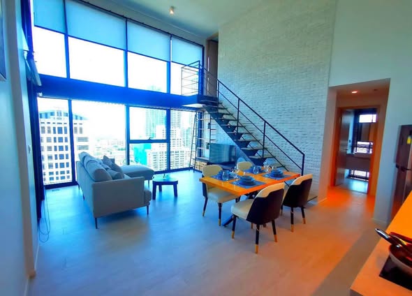 living room and room interior of The Lofts Silom by Raimon Land