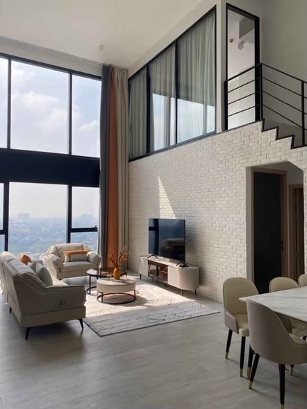 living room and room interior of The Lofts Silom by Raimon Land