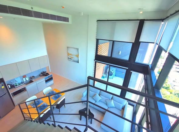 living room and room interior of The Lofts Silom by Raimon Land