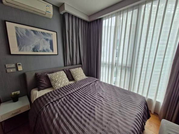 bedroom of The Lumpini 24