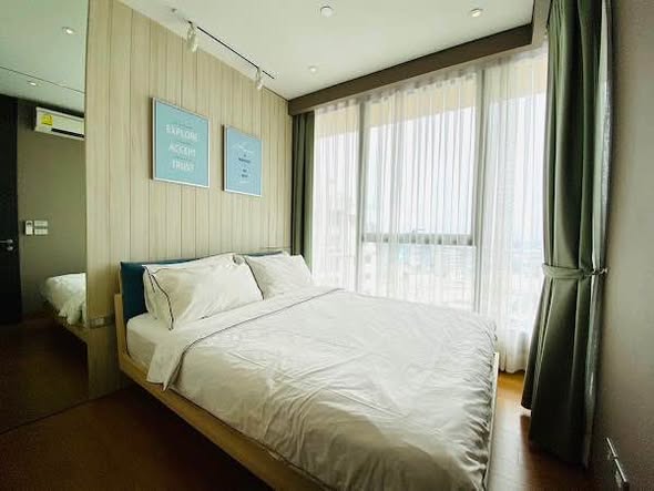 bedroom of The Lumpini 24