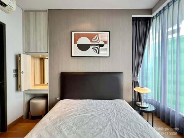 bedroom of The Lumpini 24