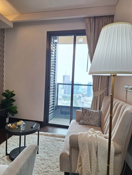 bedroom and living room of The Lumpini 24