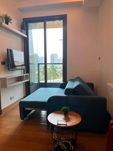 bedroom and living room of The Lumpini 24