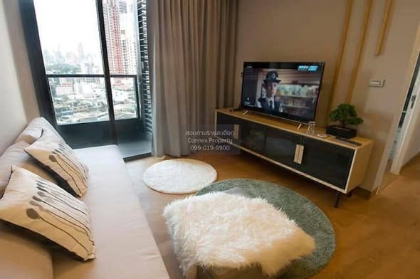 living room and bedroom of The Lumpini 24