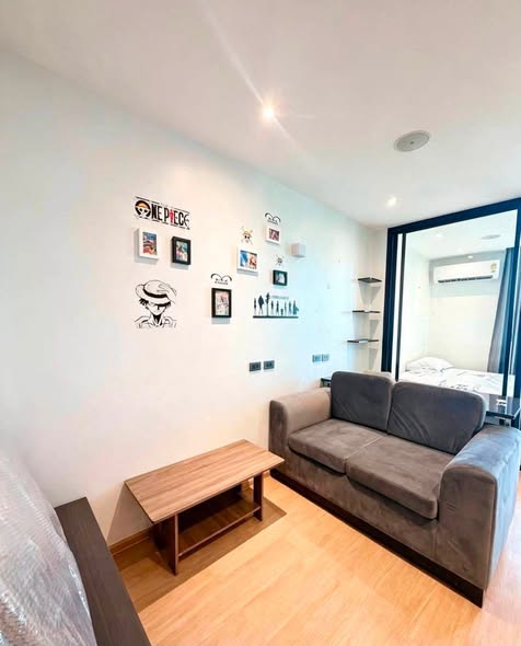 bedroom and living room of The Matt Sathorn-Thaphra