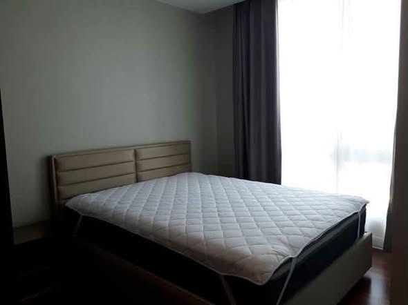 bedroom of The Metropolis Samrong