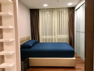 bedroom of The Metropolis Samrong