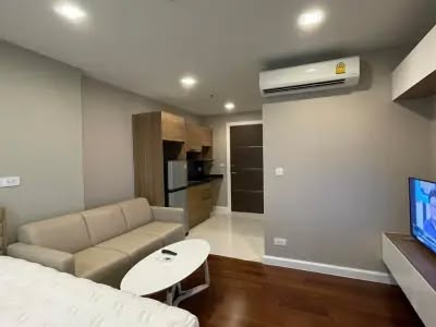 bedroom of The Metropolis Samrong