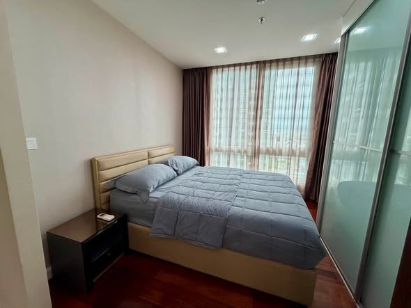 bedroom of The Metropolis Samrong