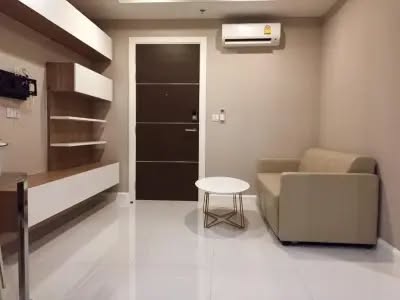 bedroom of The Metropolis Samrong
