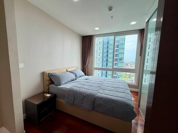 bedroom of The Metropolis Samrong