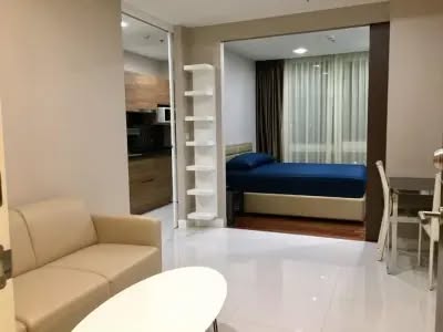 bedroom of The Metropolis Samrong