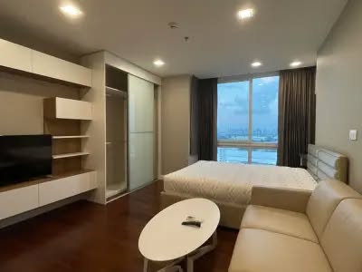 living room and bedroom of The Metropolis Samrong