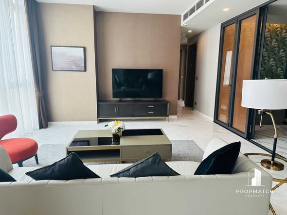 bedroom and living room of The Monument Thong Lo