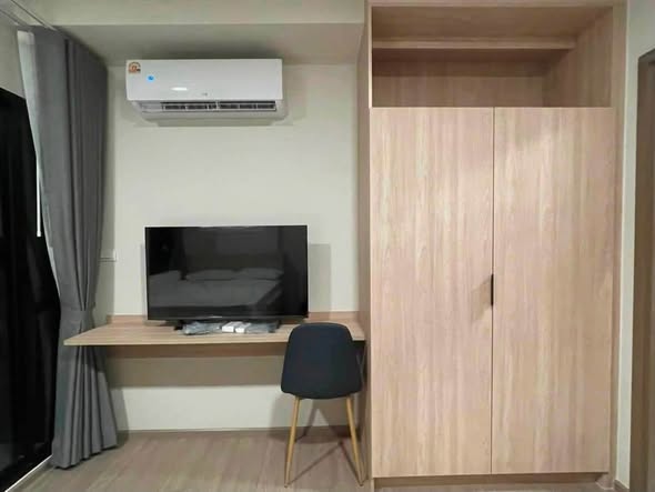 bedroom and room interior of THE MUVE Sukhumvit 107
