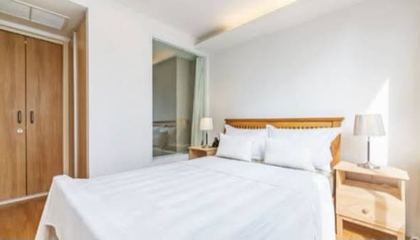 bedroom of The Nest Ploenchit