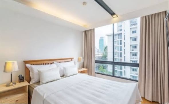 bedroom of The Nest Ploenchit