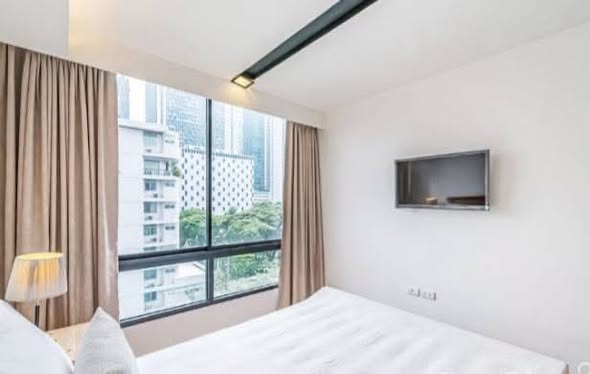 bedroom of The Nest Ploenchit
