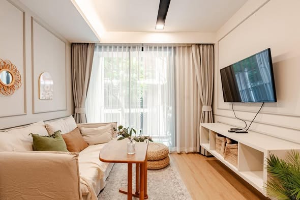 living room and bedroom of The Nest Ploenchit